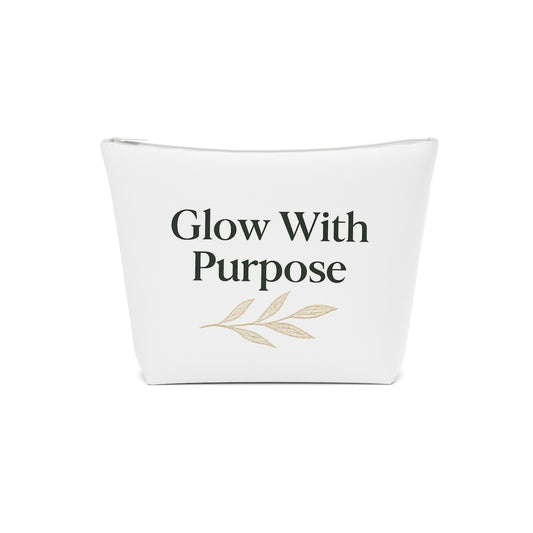 White pouch with 'Glow With Purpose' text and leaf design on a white background